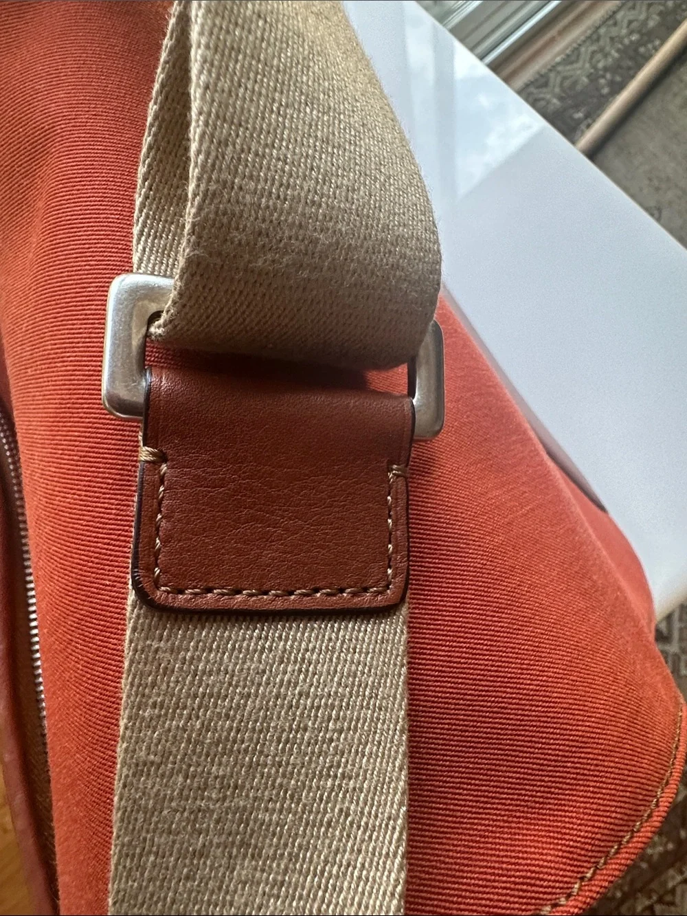 Trafalgar men’s messenger bag burnt orange with leather trim! Live New
